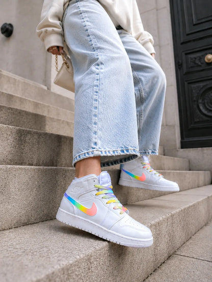 Air Jordan Mid custom pastel portée avec un jean oversize, basket personnalisée femme fabriquée à la main.