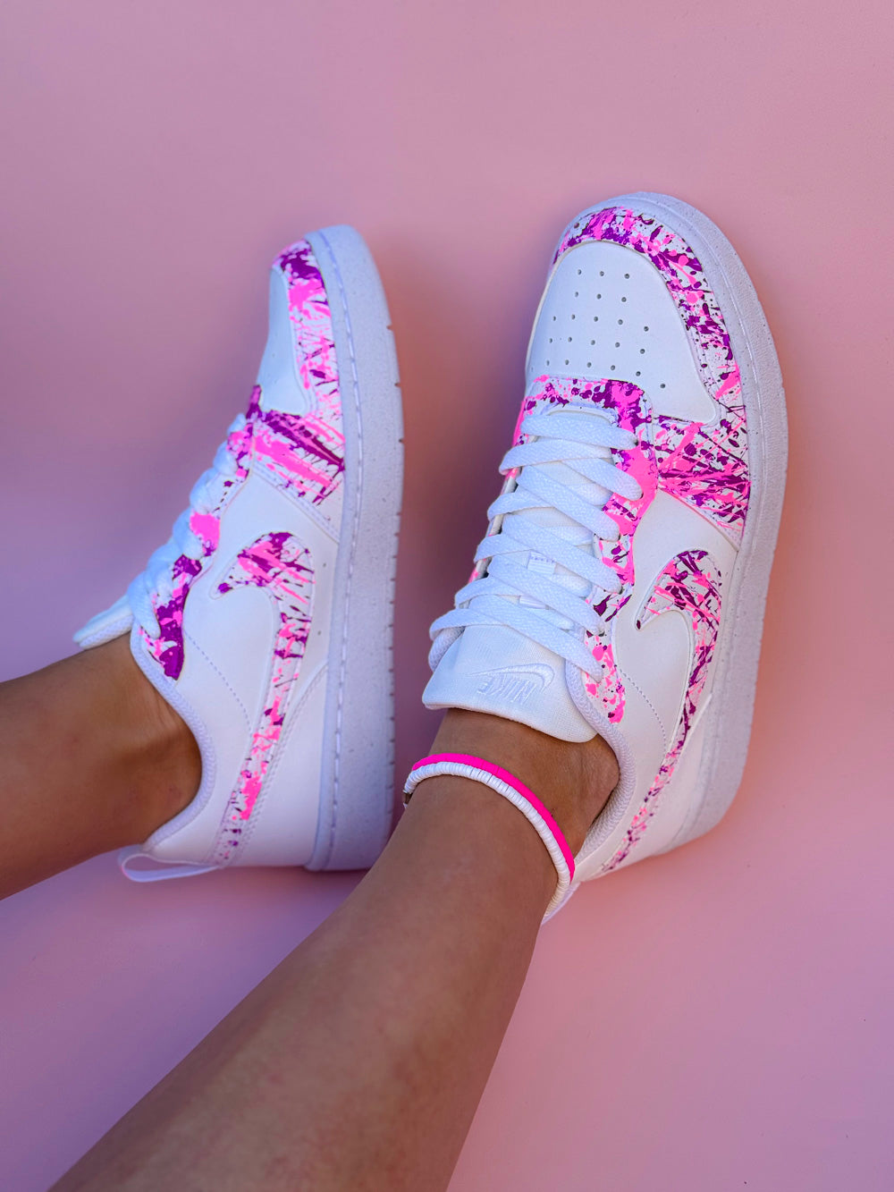 Baskets Nike Rose et Fuchsia